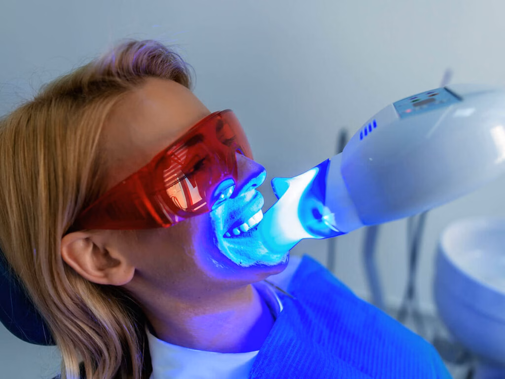 Patient receiving gentle Philips Zoom teeth whitening at Azure Dental in Liverpool — pain-free professional whitening for brighter, confident smiles.